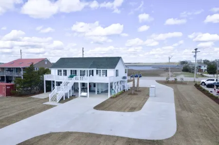 Enjoy a 3-bedroom waterfront vacation home just 10 minutes from Emerald Isle