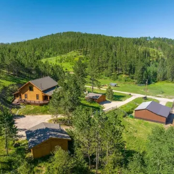 Beautiful home on 5 acres with horse barn in the scenic Black Hills!