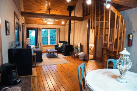 Cozy 2-Bedroom Cottage with Loft, AC, and WiFi on Peaceful 295-Acre Property