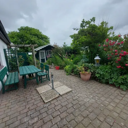 Gemütliche Erdgeschosswohnung mit Terrasse Отели в г. Вестердайхштрих