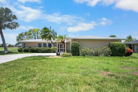 Near beaches! 2100 square foot heated pool home on the Golf Course!