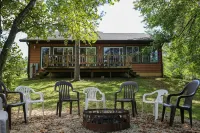 Lakeside cabin with Hot Tub and full kitchen!  Sleeps up to 12 people.