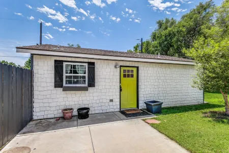 Front door parking, private covered patio with fenced in backyard