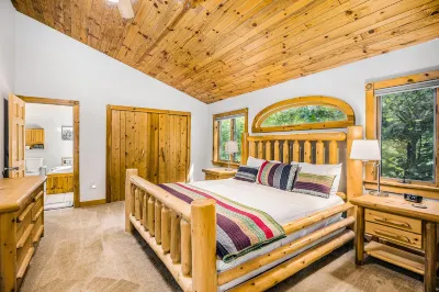 Waterfront home on Betsie River with hot tub & sauna near skiing at Crystal Mtn