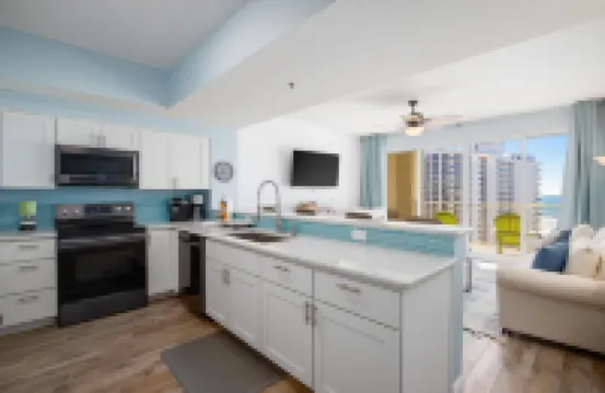 11th Floor Condo with Shared Pool, Ocean View, W/D, Fast WiFi, and Central AC