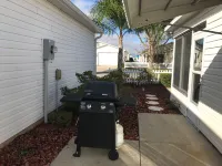 Golf Cart and BBQ Grill - Charming Villa Retreat