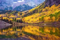 Ski slope-view condo on Gore Creek with fireplace - walk to Vail Village