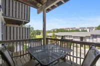 Balcony View and Golf Course Access - Stylish Escape Hotels in Oliver Township