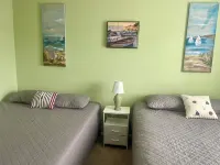 2nd Floor 3 BR Condo Close to the beach with Pool!