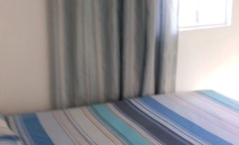 Room in Apartment - Comfortable Inn Green Sea Villa Helen Kilometro 4 Circunvalar
