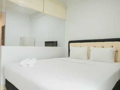 Cozy and Simply Studio Titanium Square Apartment
