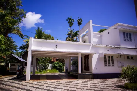Seclude by the Lake, Alleppey Отели в г. Мухамма
