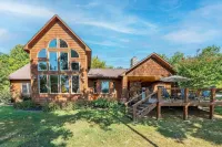 Kim's Cove Motorcycle-Friendly Cabin Features Game Room by RedAwning