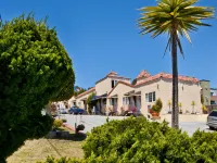 Alpine Inn and Suites Hotels near Cow Palace