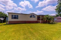 Canal-Front Home with Private Covered Boat Dock & Waterfront Screened Porch