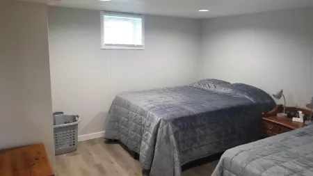 Full basement apartment quiet comfy 1-bedroom with Hot tub and fireplace