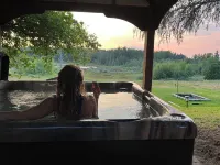 Baker View Lodging with hot tub, sound, mountain, and territorial views.