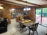 Quiet cabin in the woods w/ access to pools, river, & lakes in gated community!!