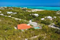 Enjoy the oceanview and relax poolside. Steps to World Famous Grace Bay Beach.