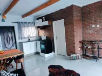 Self-contained bed sitter overlooking a beautiful scenery in an animal farm.