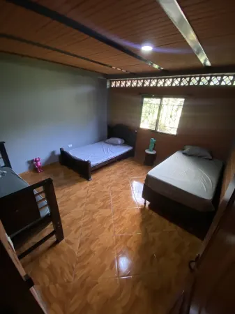 House located in between a canyon in the mountains of Antioquia.