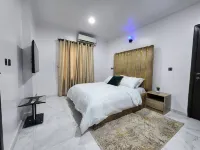 Cozy 2-bedroom bnb in beautiful Palmgrove Estate Ilupeju Lagos with AC & WiFi Hotels in Mushin