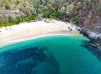 Beachfront tree cabin with deck pool