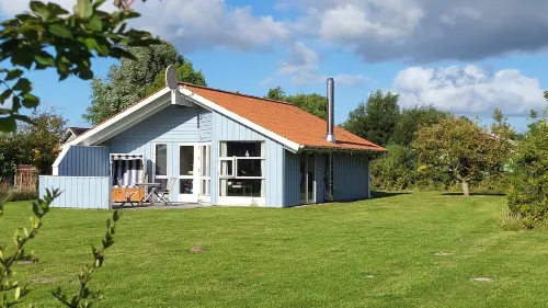 bright Danish timber house with open views to nature, pets welcome