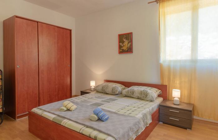 Seafront apartment Olivera with patio