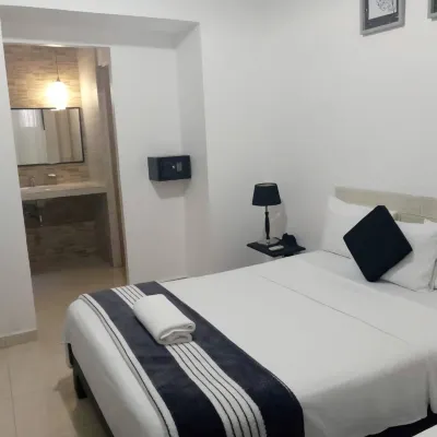 Casa Buenos Aires en Cuba - Habitación con dos camas Hoteles cerca de La Habana Vieja