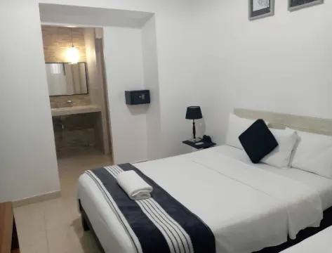 Casa Buenos Aires in Cuba - Bedroom two beds