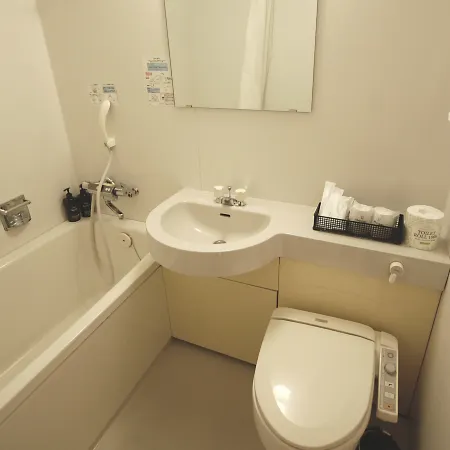 Purple Hotel Futsukaichi Отели в г. Тикусино