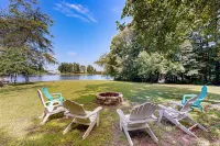Relaxing Lakeside Retreat With Boathouse, Dock, Deck, Firepit and Screened Porch - 4-Star