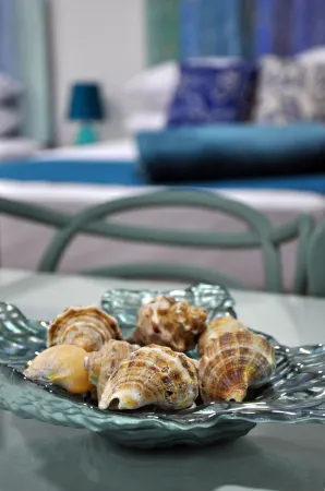 White Coral ApartaSuites Отели рядом с достопримечательностью «Плайя Спрат Бигт»