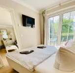 Exclusive apartment with garden and fireplace