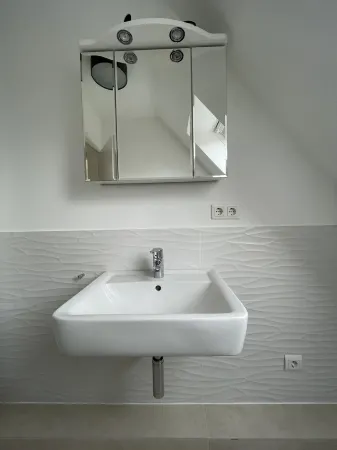 Modern attic apartment in the Bad district Отели в г. Санкт-Петер-Ординг