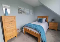 Hill Crest - cliff top cottage with stunning views of the bay.