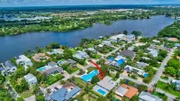 STUNNING COASTAL MODERN 3 BED POOL HOME MINUTES TO THE BEACH AND ATLANTIC AVE.