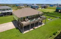This 3 bedroom beach house is the PERFECT space to get “A Wave From It All