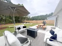 Coastal Retreat 10 Minutes to Beach w/ King Bed, Grill, Fire Pit & Game Room Hotels in Stump Sound