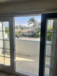 Clean and spacious unit with private balcony 1.5 blks from the beach!