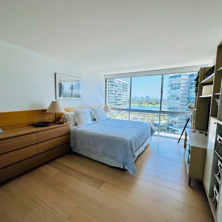 Beach and city views in condo with backyard access to beach and walkable town.