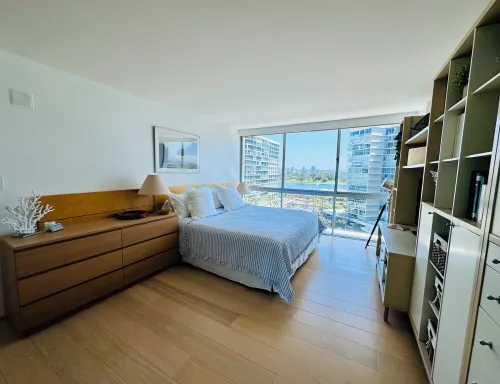 Beach and city views in condo with backyard access to beach and walkable town.