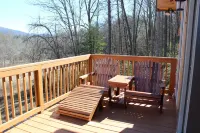 New cabin with king size bedrooms, en suite bathrooms, smart TV, decks & views.