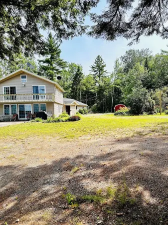 Beautiful and private lakefront home on the sandy shores of South Twin Lake