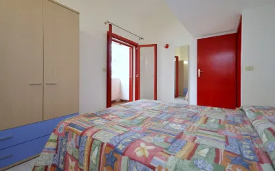Ampio attico in residenza con piscina