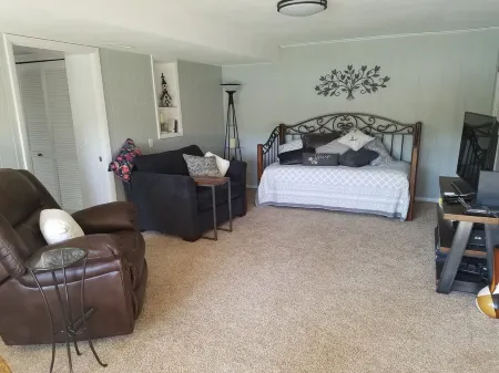 Quiet  Location, Beautiful Lakefront Home in a Cove. Private Covered Boat Dock!