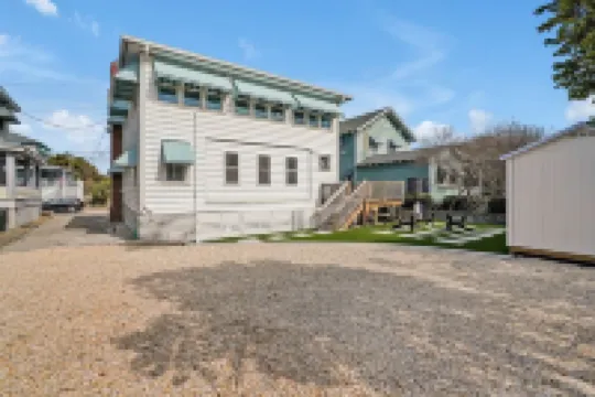 August Palms - a Coastal Haven Just Steps Away from Wrightsville Shore!