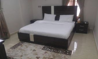 Quintessential Hotel & Suites by Badala