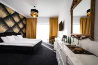 POŁUDNIK Park Boutique Conference&Spa Hôtels à proximité de : Willa Karowów